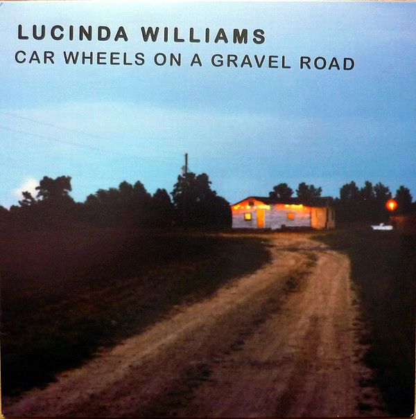 Car Wheels On A Gravel Road