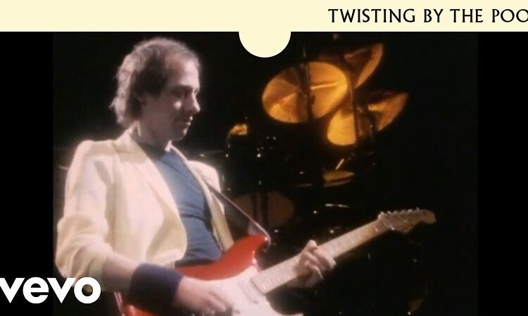 Dire Straits - Twisting By The Pool (Official Music Video)